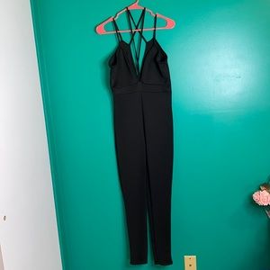 NWOT Black criss cross strap jumpsuit